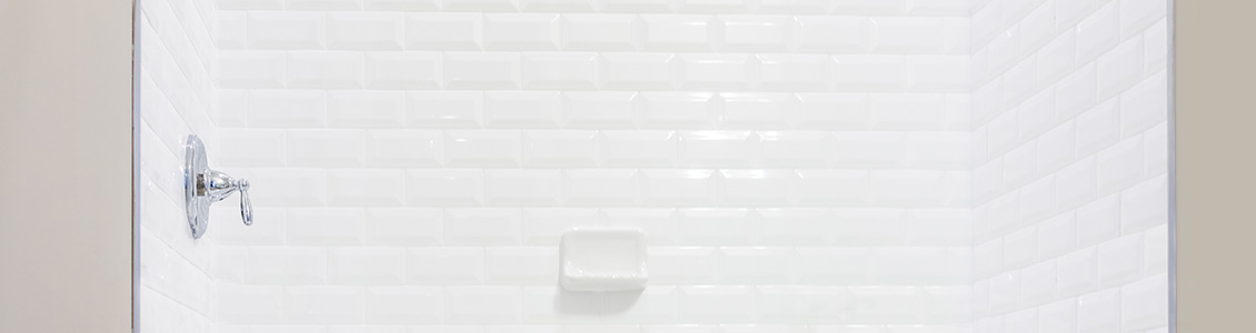 Back Wall of a Shower Recently Covered With Shower Liner Panels