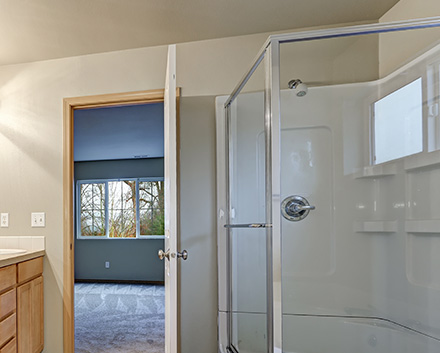 A Beautiful and Affordable White Shower Resulting From a Tub-to-Shower Conversion